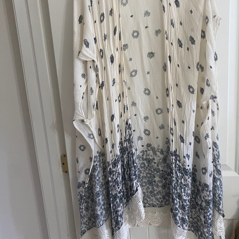 Lightweight, boho, floral & lace cover up.
